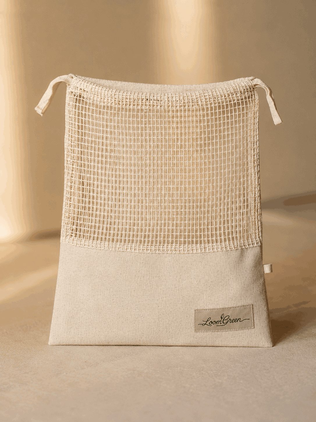 Loom Green reusable cotton mesh bag with canvas base and drawstring